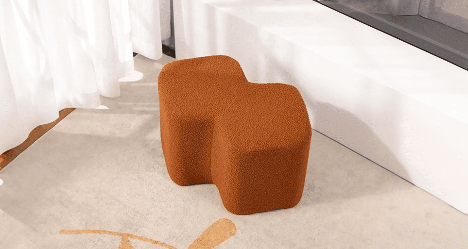 Comfortable ottoman seat, a cozy touch from Estre's collection.